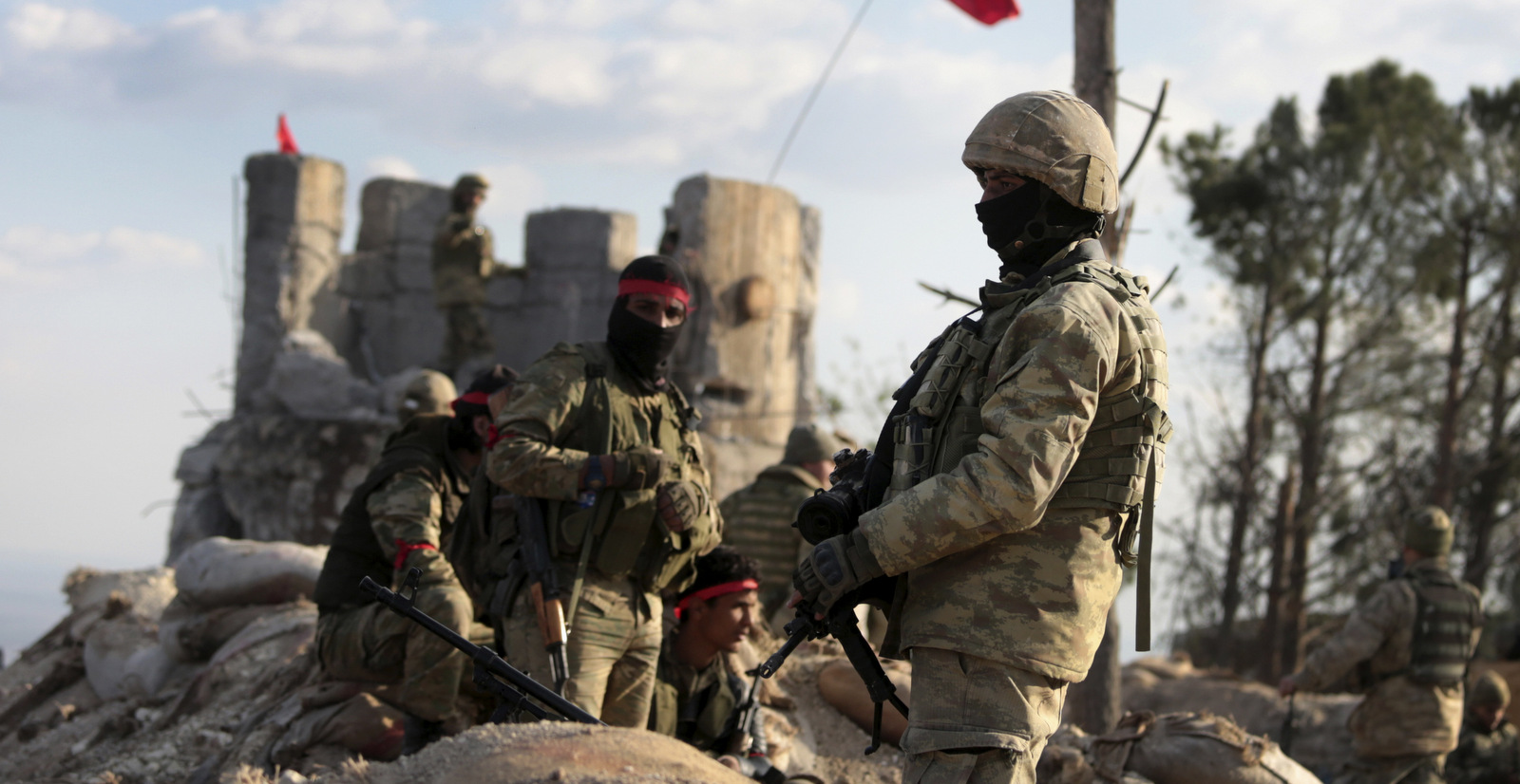 Turkey-backed Syrian rebels and Turkish troops secure the Bursayah hill, which separates the Kurdish-held enclave of Afrin from the Turkey-controlled town of Azaz, Syria, Jan. 28, 2018. (AP Photo)