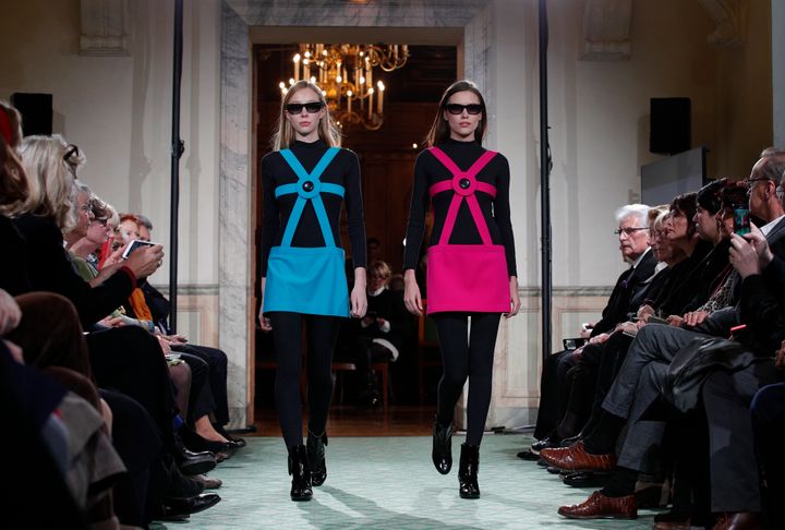 Models wear creations during a 2016 show to mark 70 years of creation by Pierre Cardin in Paris.