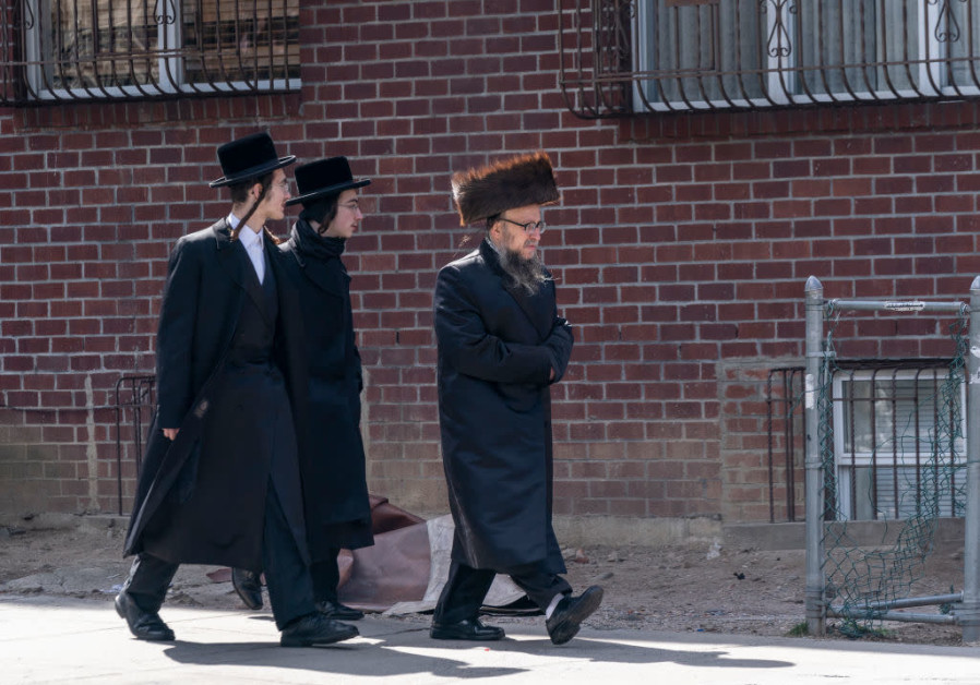 Satmar Jewish men walking in a Brooklyn neighborhood/ LEV RADIN/PACIFIC PRESS/LIGHTROCKET VIA GETTY IMAGES