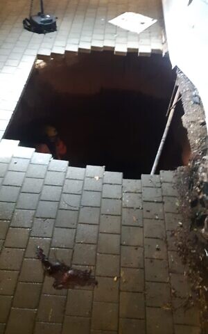 Teen rescued after falling into Herzliya sinkhole