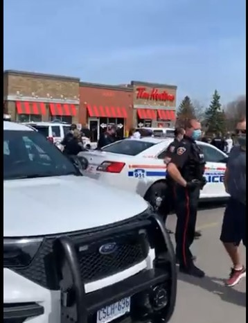 Ten police cars and one K-9 unit sent to Tim Hortons in Durham Ontario to deal with person legally n...