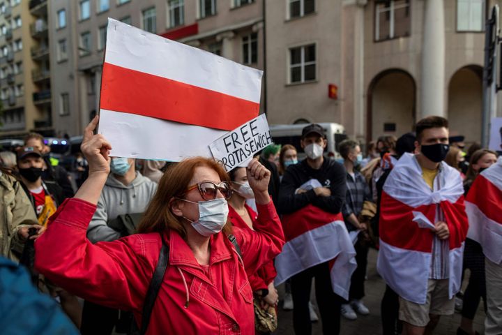 Belarusians living in Poland and Poles supporting them take part in a demonstration Monday in front of European Commission of