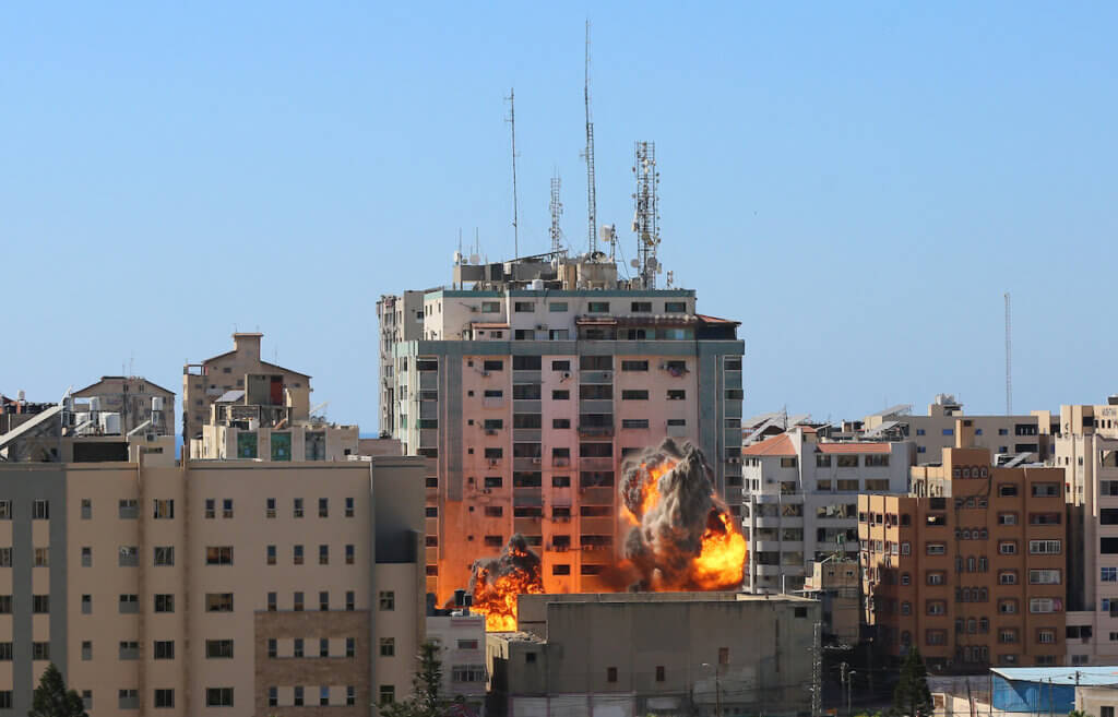 Live blog: Israeli airstrikes target international media offices, civilian homes in Gaza