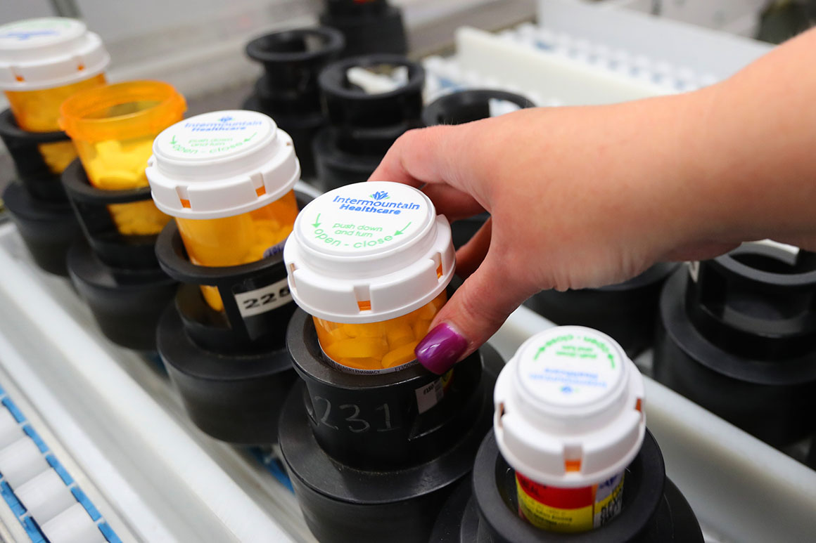 Bottles of prescription drugs are ready for packaging and shipping after they were filled.