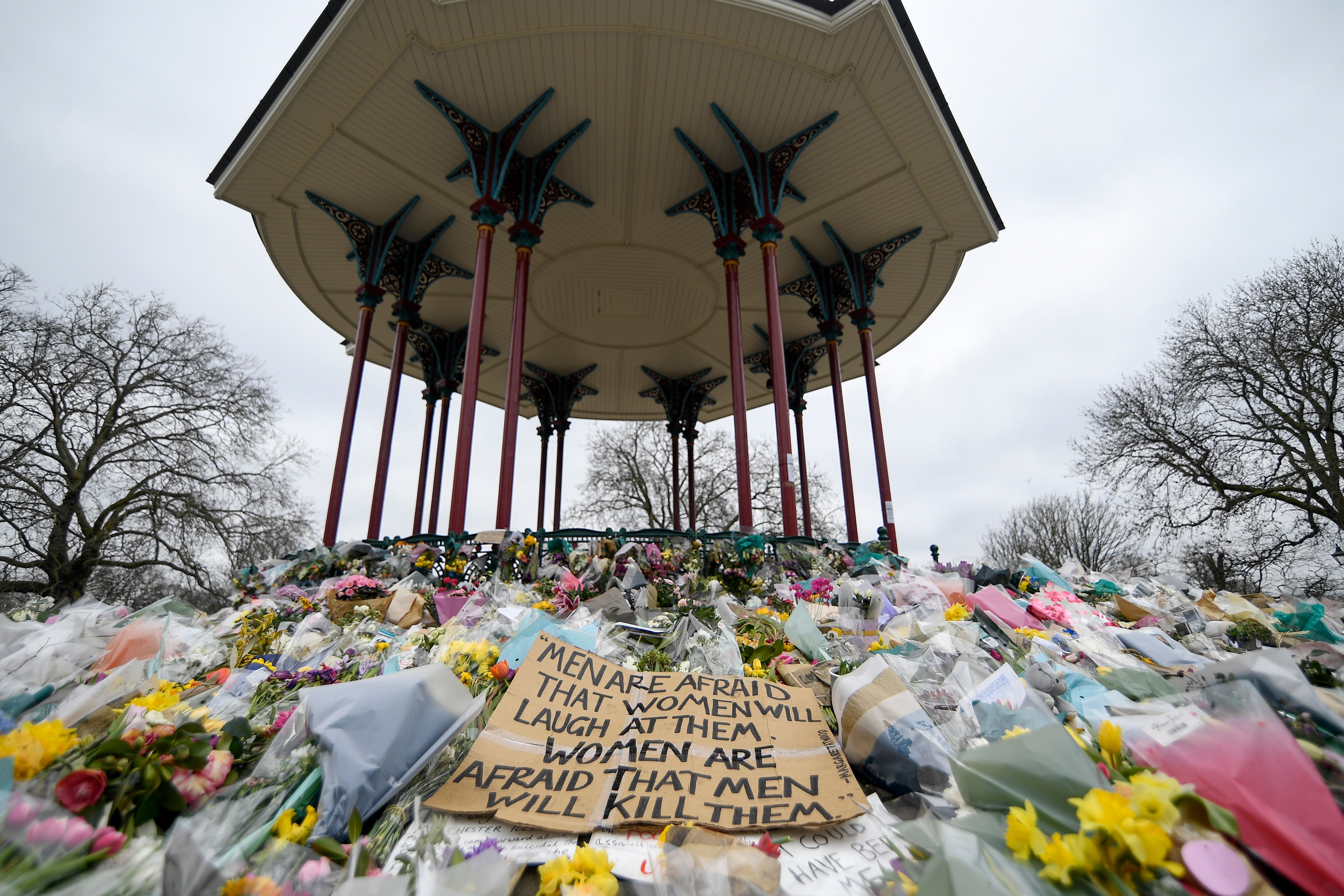 In this Saturday, March 20, 2021 file photo, floral tributes and messages are placed at the bandstand on Clapham Common in Lo