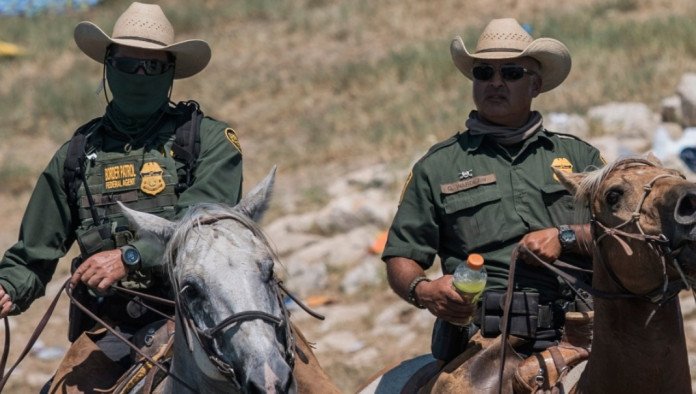 Biden Sends Two Guys Holding Horse Reins To Help Defend Ukraine Border