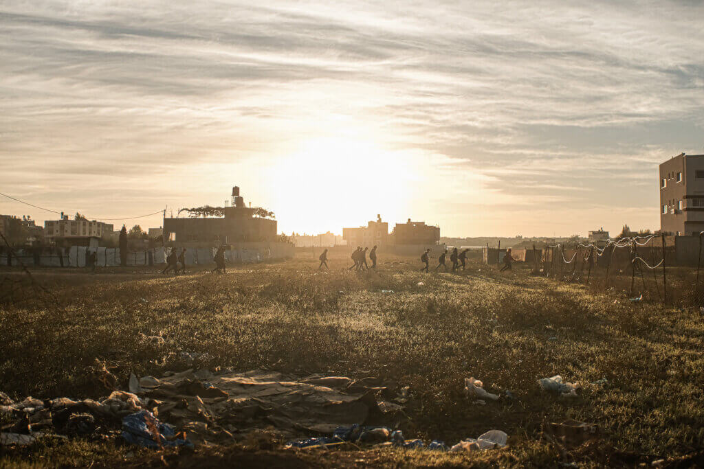 School children seen taking a shortcut on their way to school during the early morning in Beit Hanoun, Gaza, December 04, 2021 (Photo: Mahmoud Nasser)