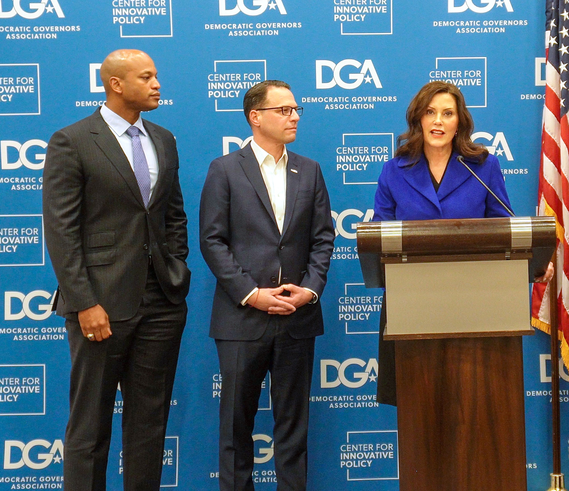 Gretchen Whitmer, right, speaks as Wes Moore, left, and Josh Shapiro, middle, look on at the Democratic Governor's Association annual winter meeting in New Orleans on Dec. 2, 2022.