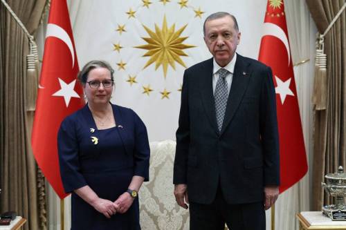 Turkish President Recep Tayyip Erdogan (R) poses for a photo with the Israel's Ambassador to Ankara Irit Lillian (L) after receiving the letter of credence from her at the presidential complex in Ankara, Turkiye on December 27, 2022 [Murat Kula/Anadolu Agency]