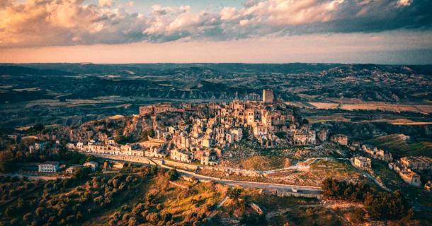 These abandoned cities from across the globe are the remnants of a different era. Pictured: Aerial view of Craco, Basilicata region of Italy. Source: Pavlo Glazkov / Adobe Stock