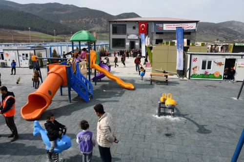 A view of children playing at a container city set up at the Islahiye district of quake-hit Gaziantep, Turkiye on February 24, 2023 [Adsız Günebakan / Anadolu Agency]