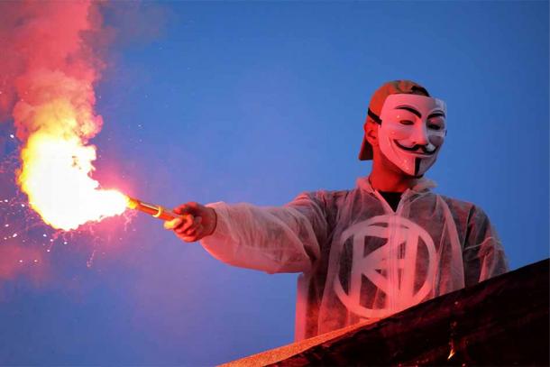 Guy Fawkes masks have become a symbol of anarchy and protest against tyranny, seen here during a protest in Madrid. Source: Daniel López García / CC BY 2.0