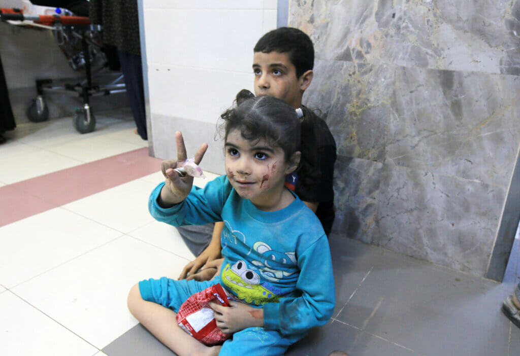 Injured children brought to receive medical care at al-Shifa Hospital after an Israeli airstrike on the al-Nasan building in Gaza City, October 27, 2023. (Photo: Saeed Jaras/APA Images)