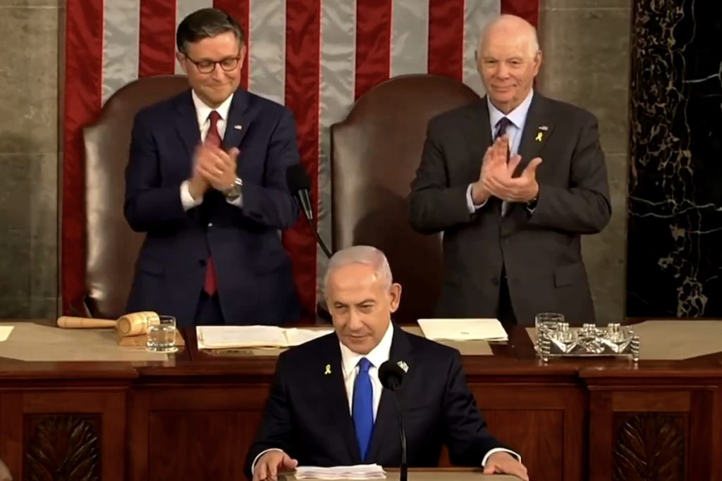 Benjamin Netanyahu is applauded by Rep. Mike Johnson and Sen. Ben Cardin during his speech to Congress on July 24, 2024